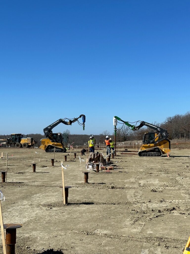 Dual skid steer site install